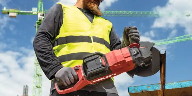 Jobsite worker using AD 30D-22 Angle grinder