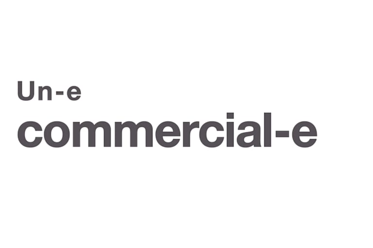 Text : "un-e commercial-e"
