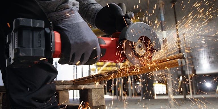 person using hilti angle grinder