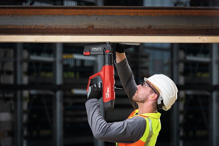 worker using Hilti tool