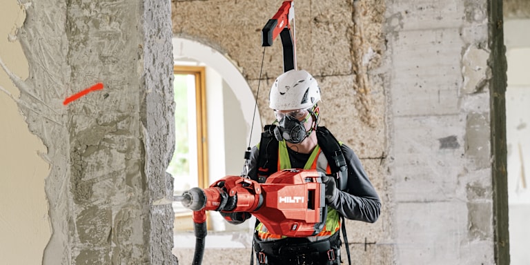 jobsite worker using Hilti Tool balancer