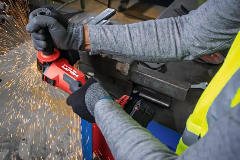 person using grinder