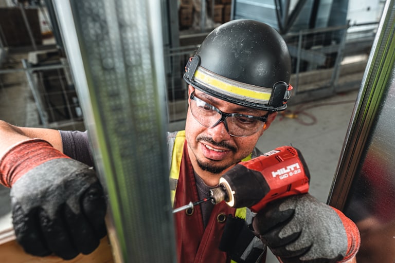 person using hilti tool