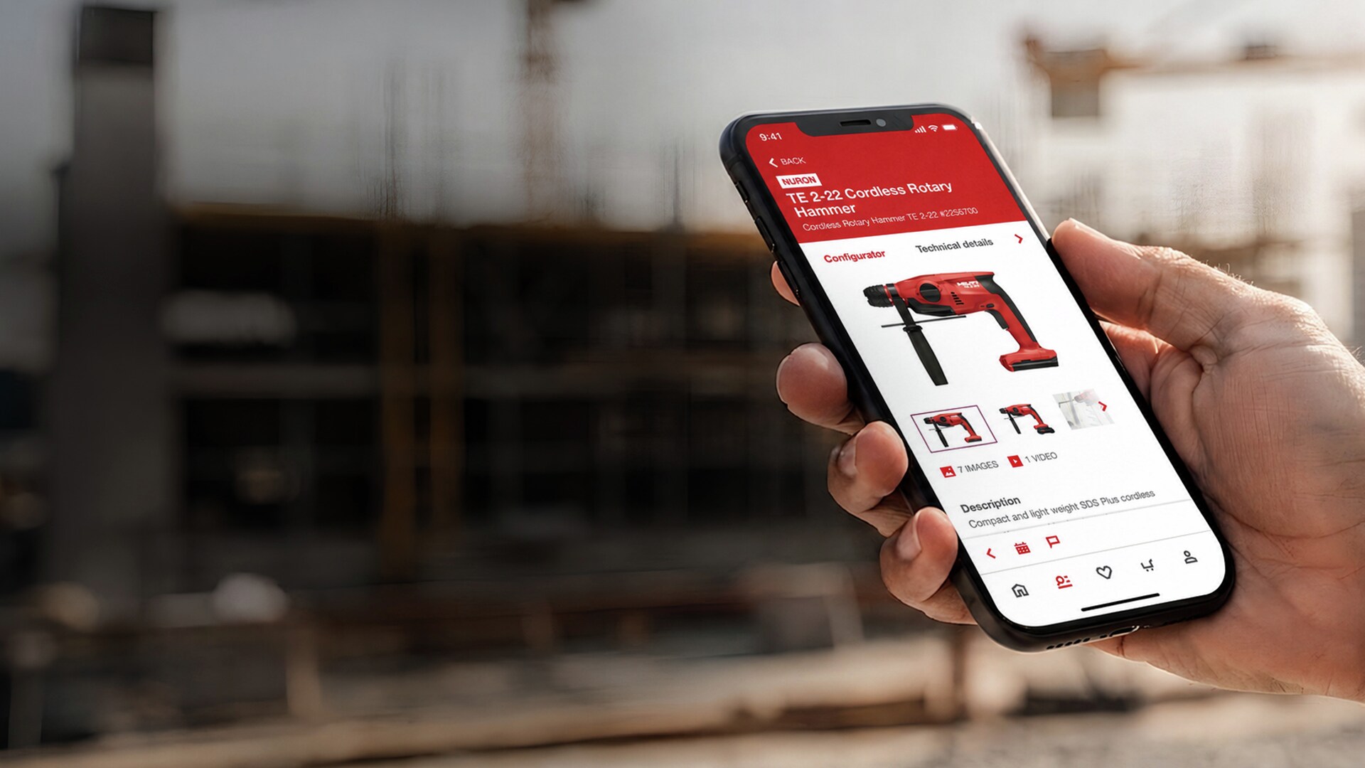 Hand holding smartphone showing Hilti App