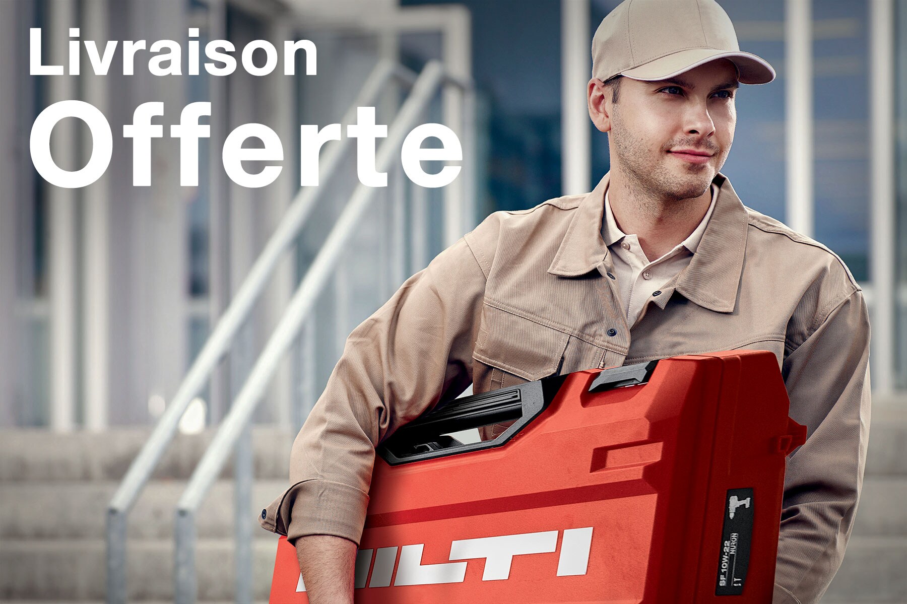 Un homme avec un coffret à outils Hilti rouge, accompagné du texte : "Livraison Offerte"