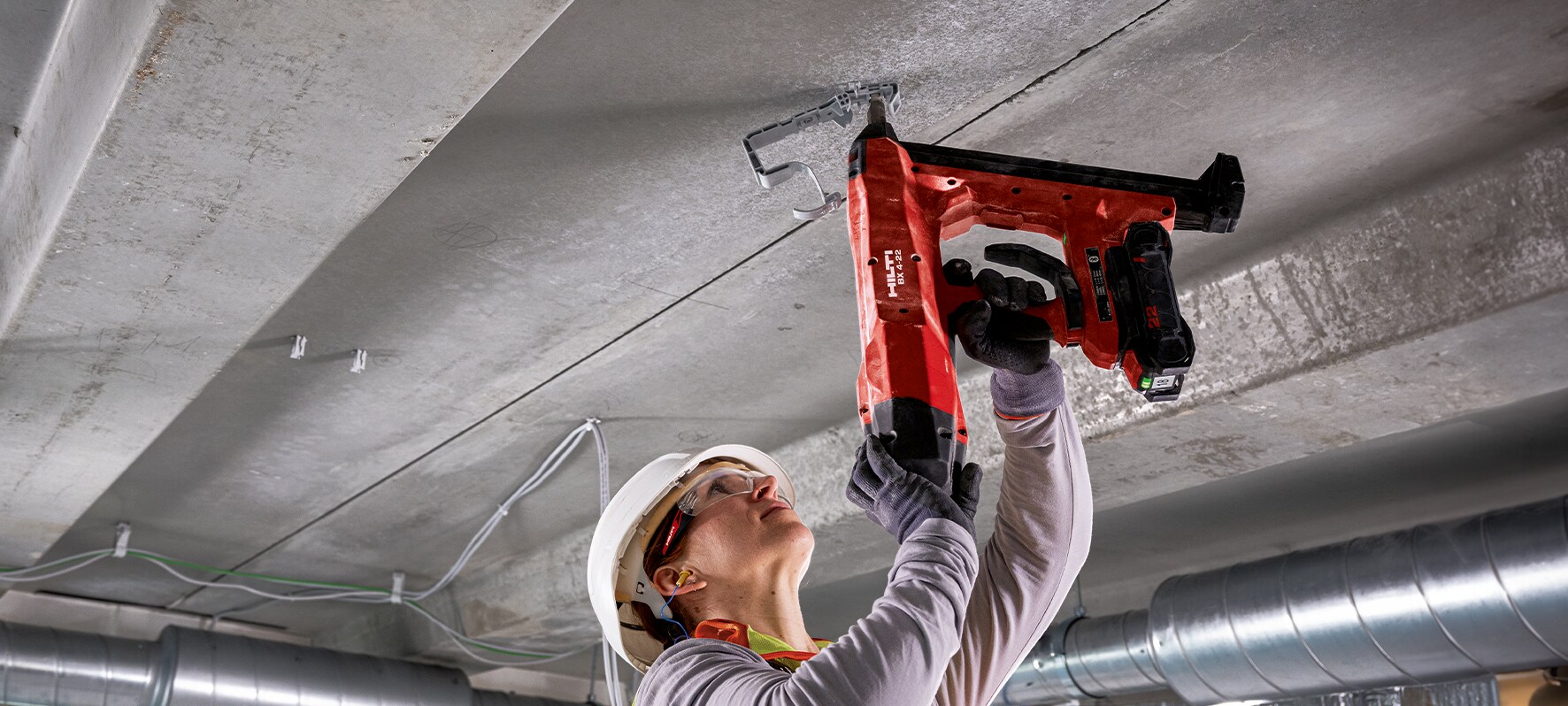 MAN USING HILTI DIRECT FASTENING TOOL